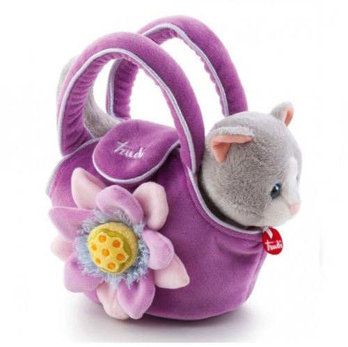 Trudi Kotek w fioletowej torebce z kwiatkiem